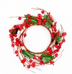 Candle ring with red berries and holly leaves